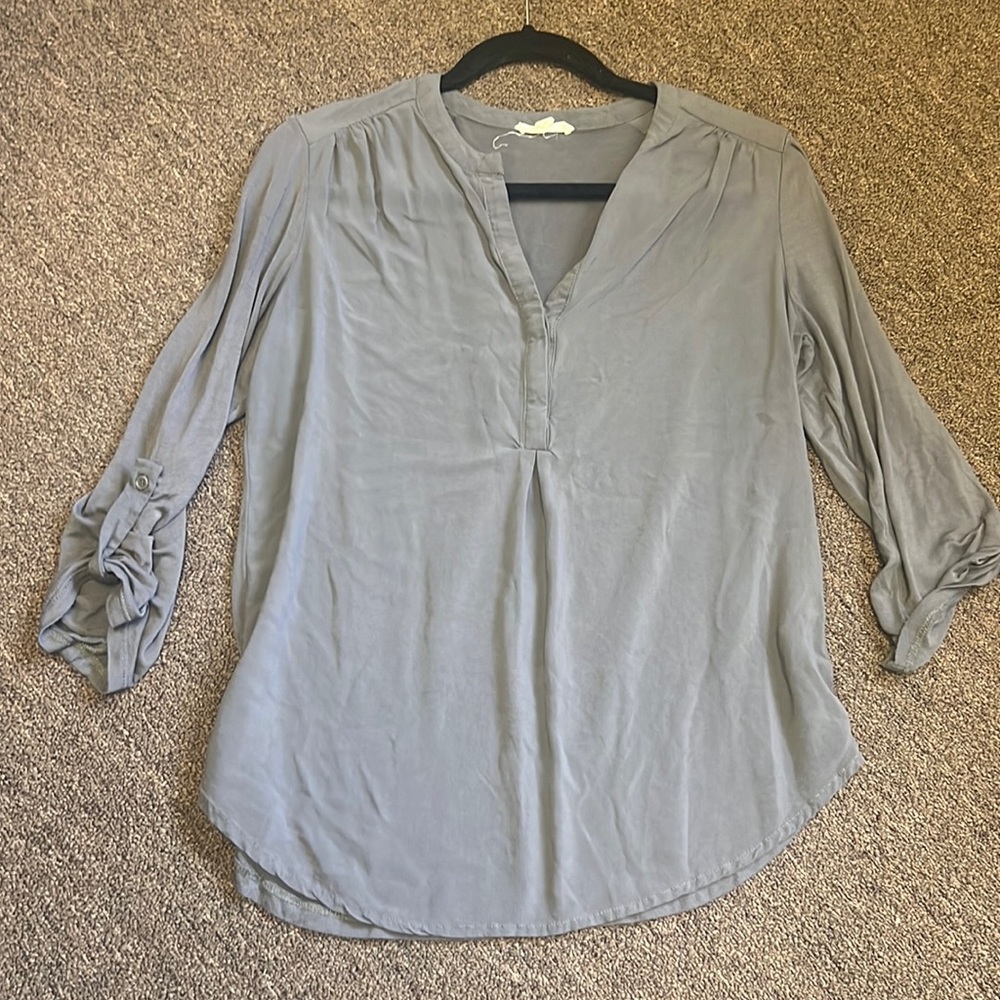 Gray top.